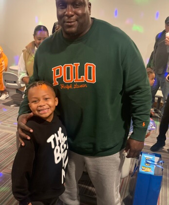 Jerrell Powe with his son.